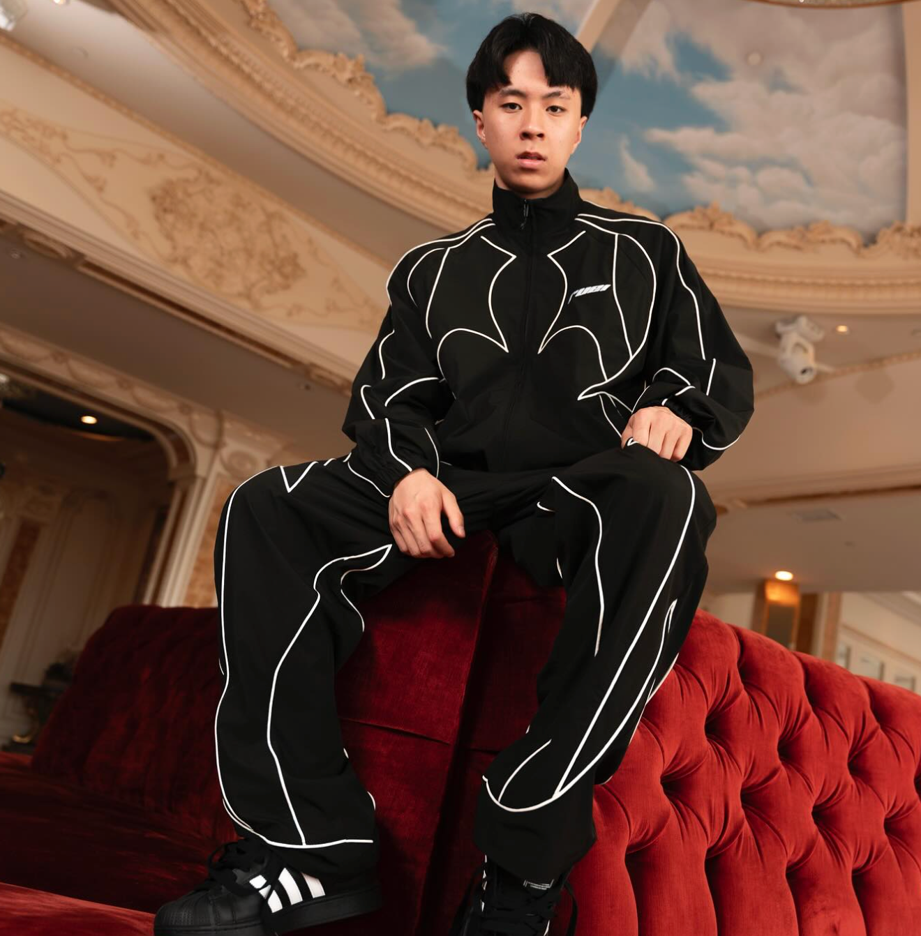 Kai Cenat and Ray wearing RUEI streetwear tracksuits from the first RUEI drop